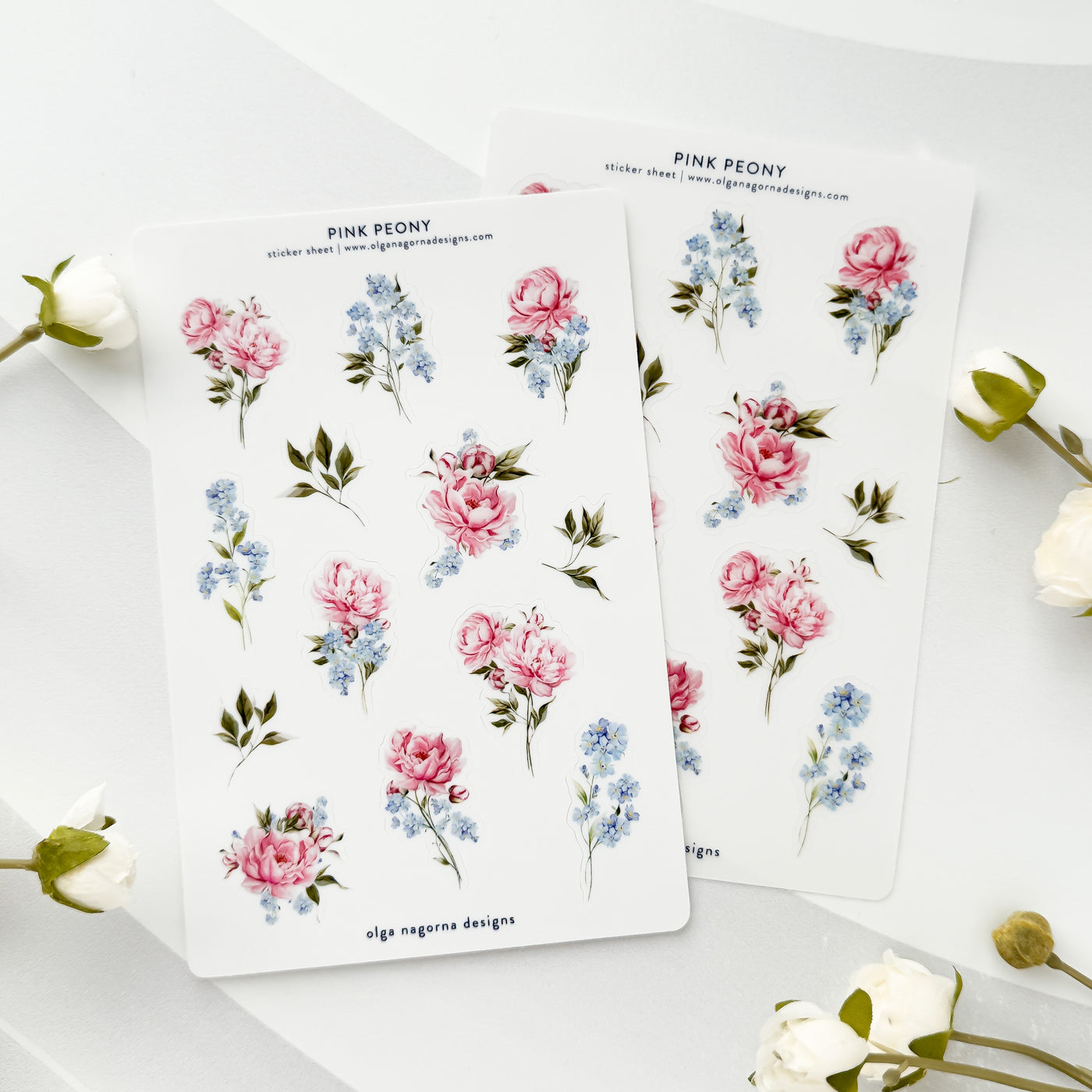 Floral sticker sheets with pink peony design on a white background.