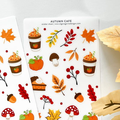 Autumn-themed sticker sheet with coffee cups, pumpkins, leaves, and other fall elements on a white background.