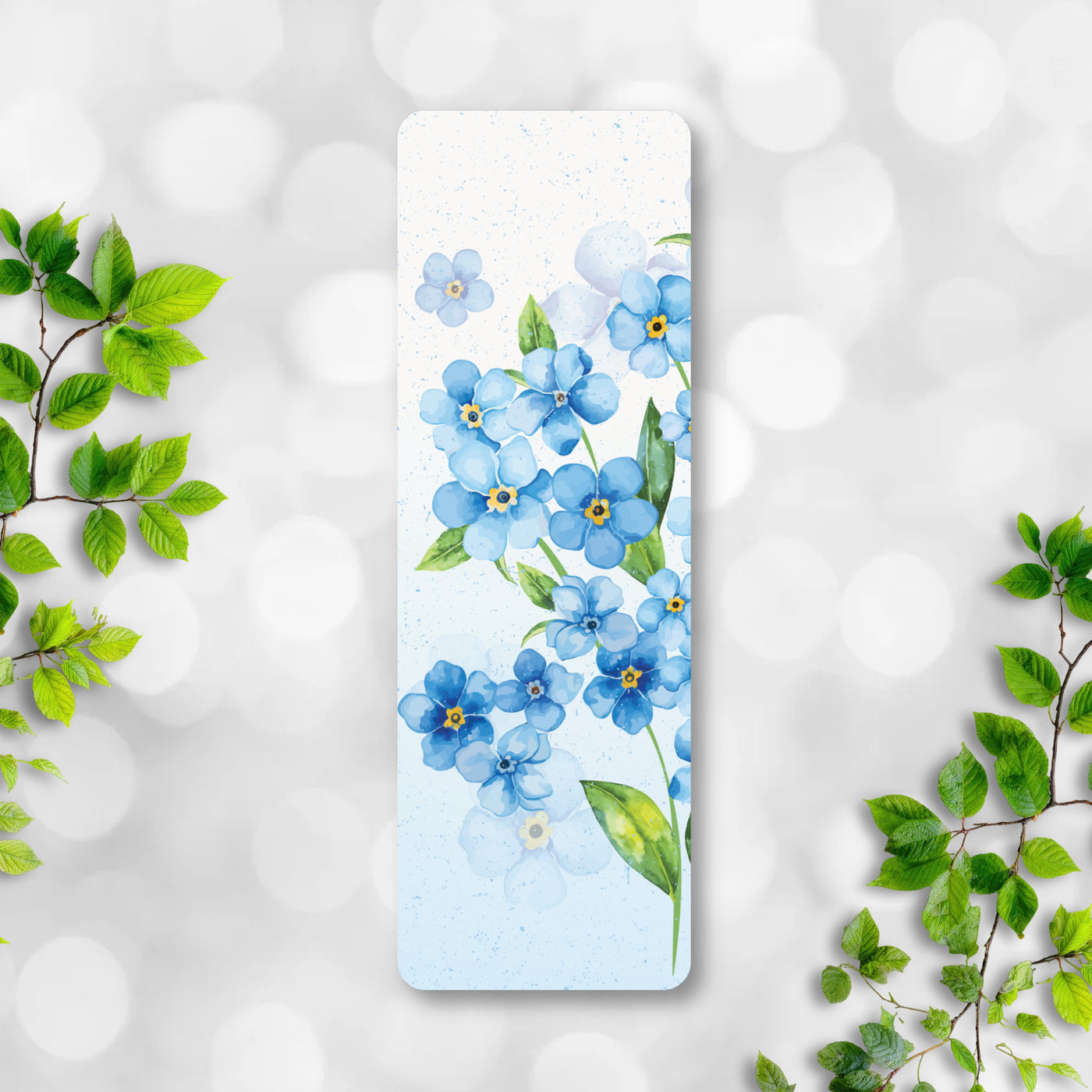 Bookmark with blue floral design on a white background.