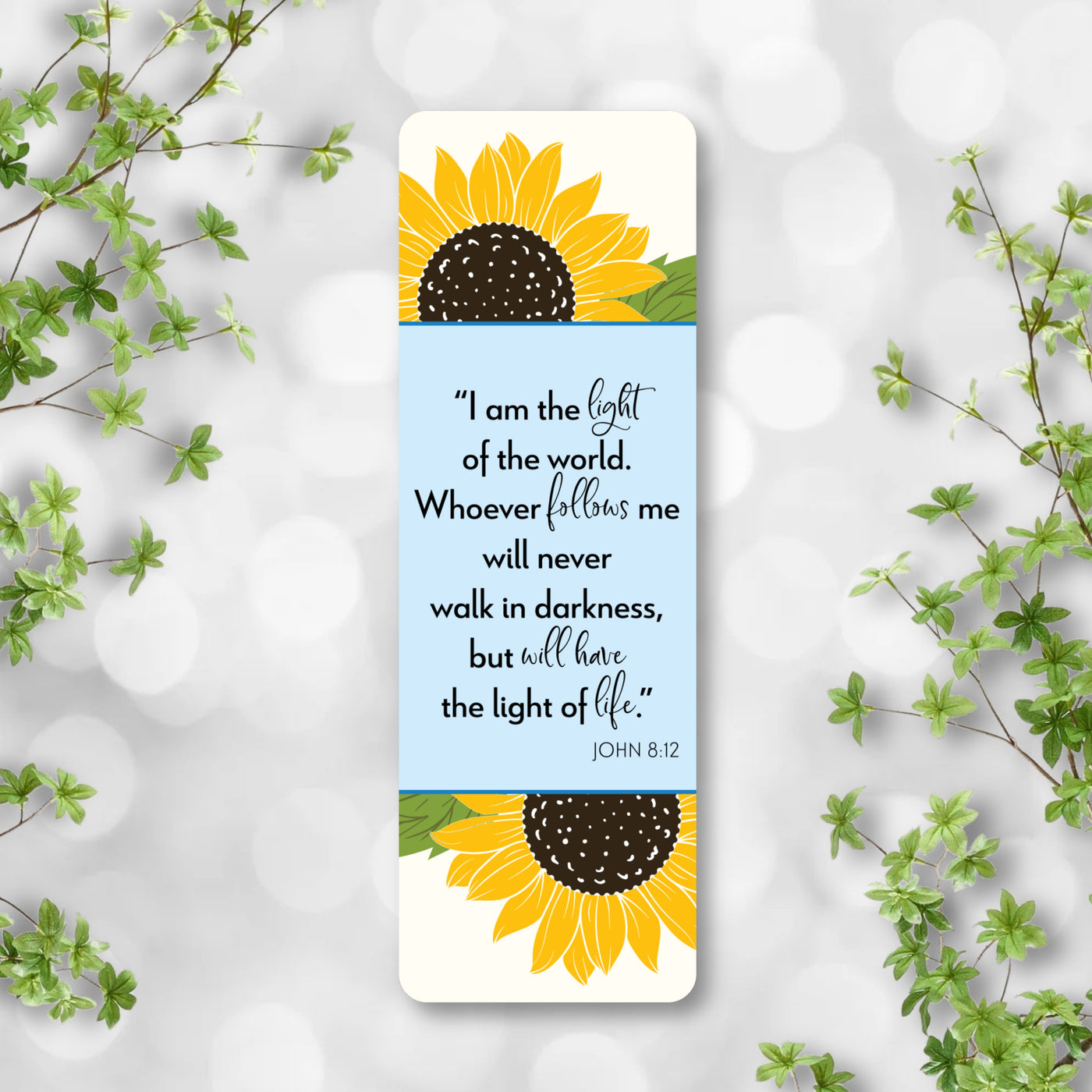 Bookmark with sunflower design and inspirational quote on a light background.